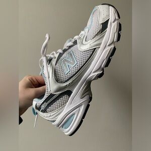 Silver and baby blue Women’s New Balance 530, barely worn size 6!